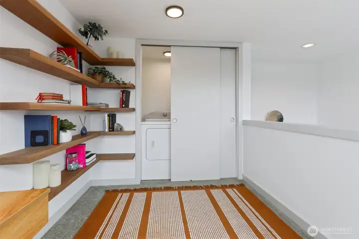 Solid oak shelves and convenient laundry.