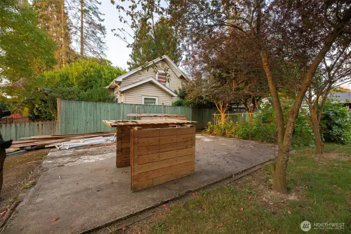 Concrete pad in back yard.