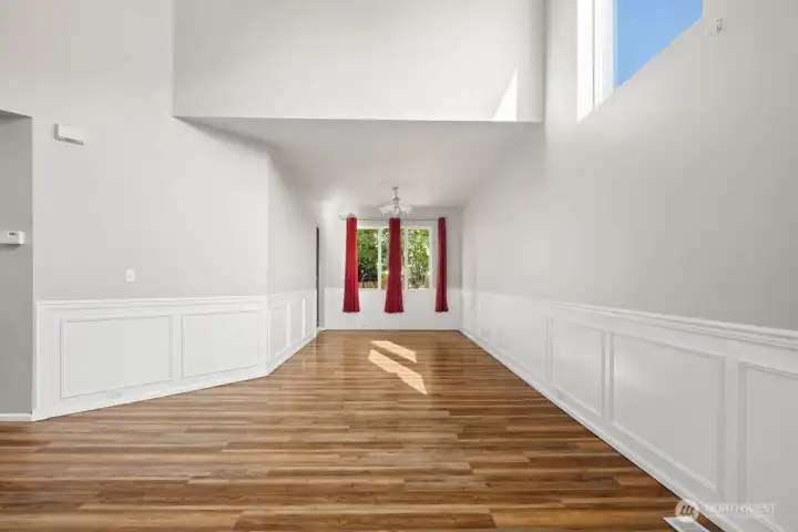 Wainscoting and fresh paint combine with easy-care laminate flooring to make this home both low-maintenance and visually appealing. The property also features real hardwood floors, adding warmth and timeless charm to its already inviting design.