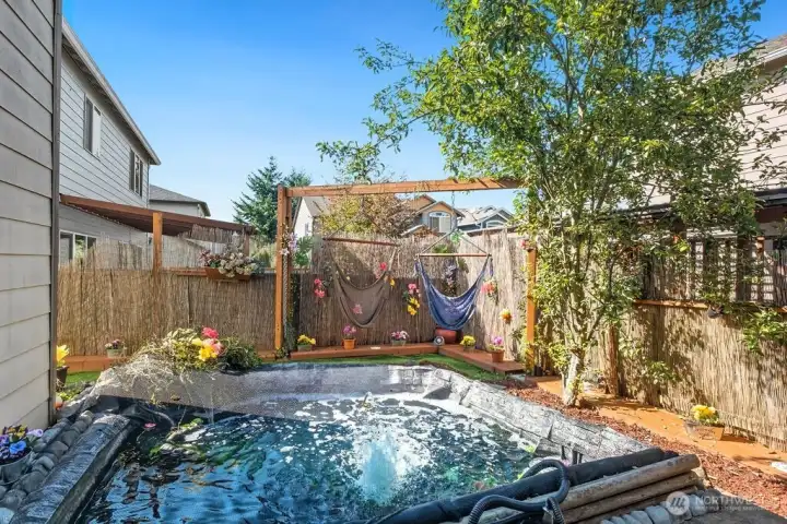 Koi pond with hammocks and relaxing patio!