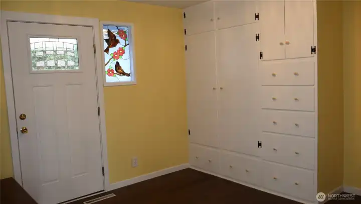 Built in cabinets in the foyer