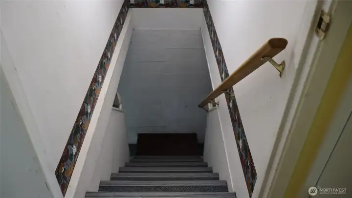 Entry to the basement with 2 mostly finished rooms