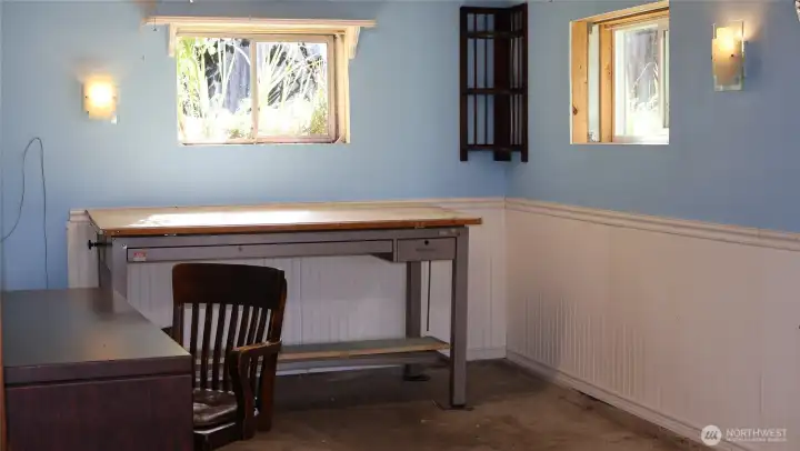 Home office has plenty of space for 2 large desks and furnishings, plus its own view and entry.