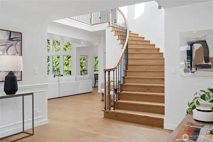 Grand Curved Staircase (New engineered hardwood flooring thoughout)