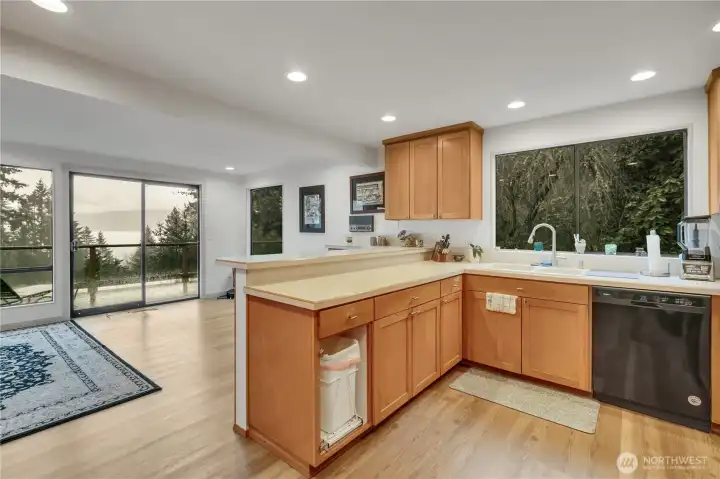 Eating bar area, looking into dining area and outside to the upper deck.