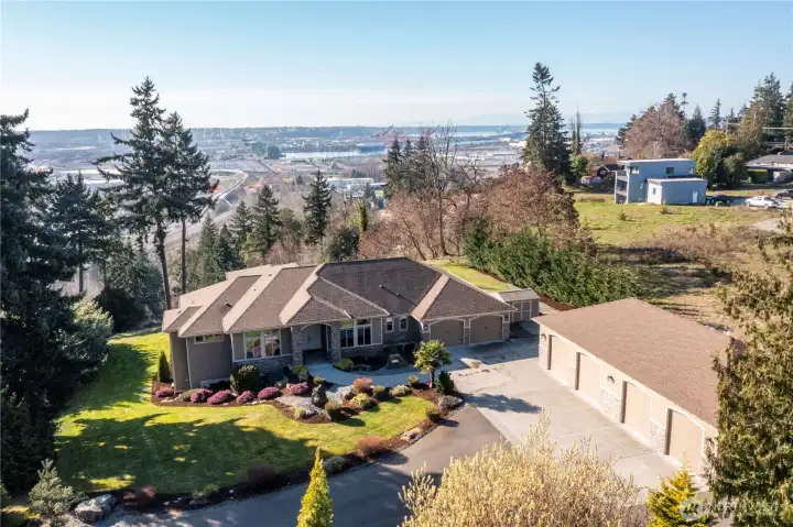 3184 square foot, one level main house with attached 1052 square foot garage. PLUS  1800 square foot attached garage and shop. PLUS detached ADU featuring 981 square feet of one level living with an attached 2 car garage