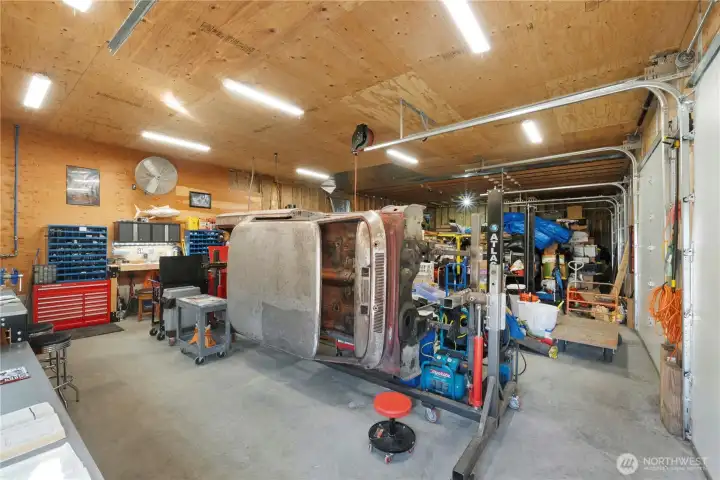An impressive 1800 sq ft detached garage/shop, with its own 115V service, delivers enless opportunities for hobbies and toys.  The geothermal heat keeps this space warm in the winter and cool in the summer.