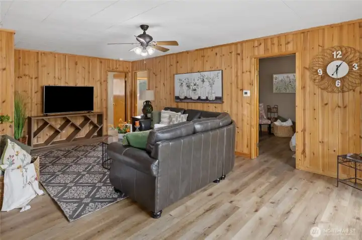 Beautiful tongue and groove accent walls and new laminated hard wood floors.
