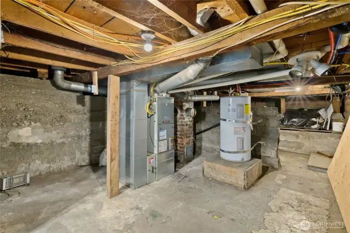 Unfinished Basement which a great storage and also a large laundry room area.