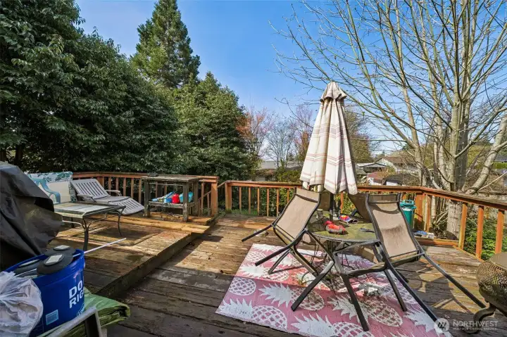 Private deck space with room for seating and outdoor dining, offering a functional extension of the living area.