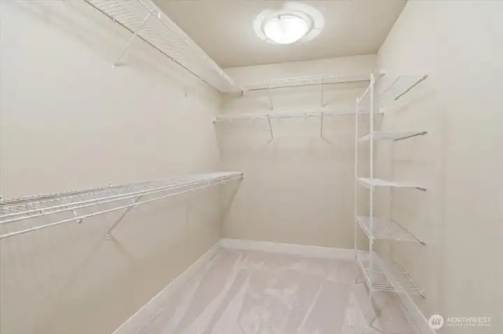 Spacious primary bedroom closet.