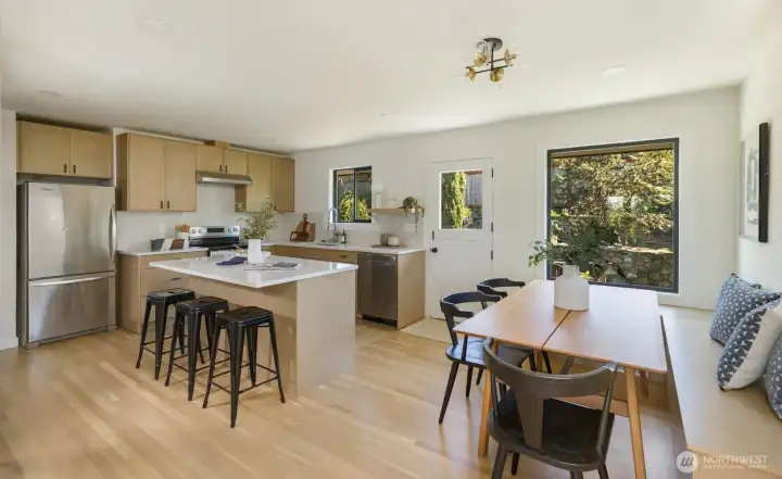 Enjoy built in bench seating for two eating areas.