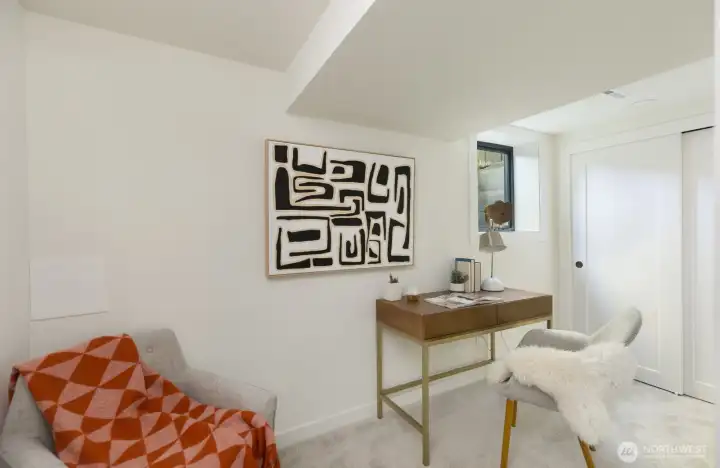 Downstairs, Office/Bed 4. Window is proper hieght for legal egress.