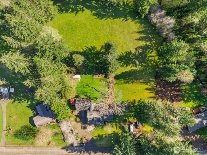 Top down view of property up to tree line.