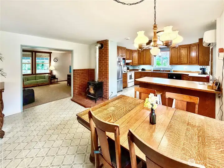 View from dining looking towards kitchen and living room. Plenty of room for a large table.