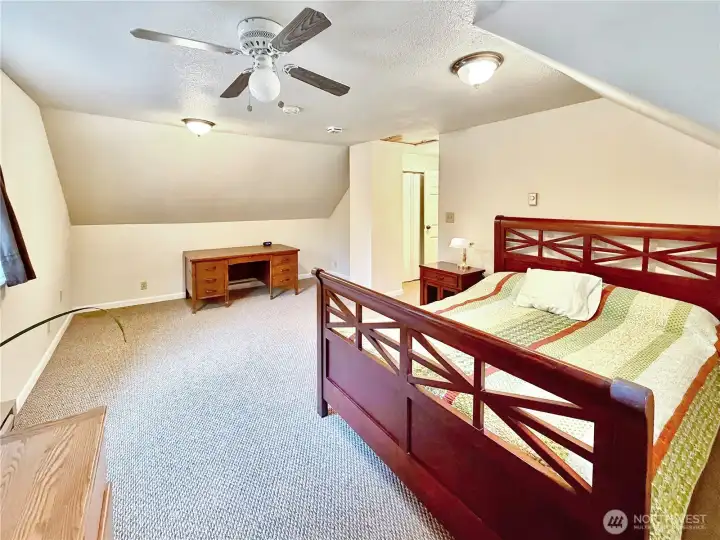 Another view of bedroom 2 with ceiling fan.