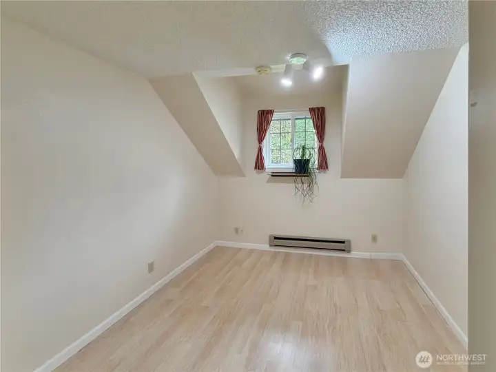Bedroom 4 features laminate flooring and a dormer.