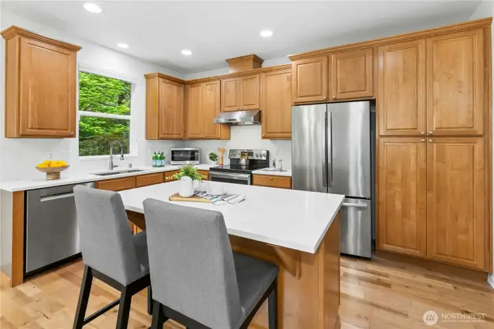 Perfect kitchen layout with tons of storage and extra seating space at island! Bosch 800 Series dishwasher installed in 2025.