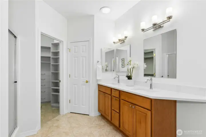 New quartz countertop & backsplash, as well as new contemporary light fixtures, mirrors, and faucets installed in 2025.