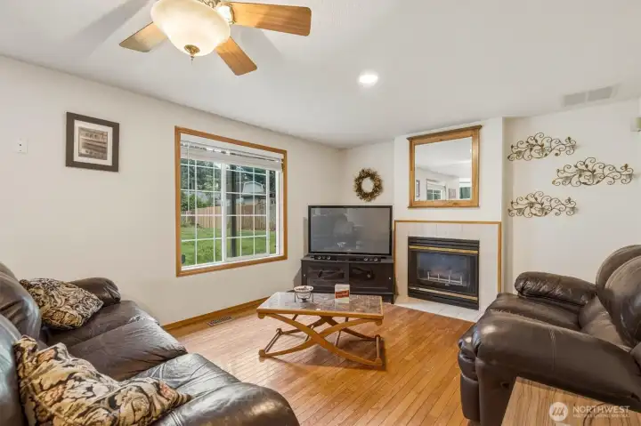Living room with gas fireplace.