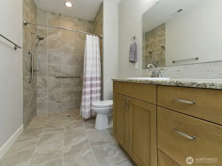 Primary bath also has a 'No Step walk-in or roll -in' shower.