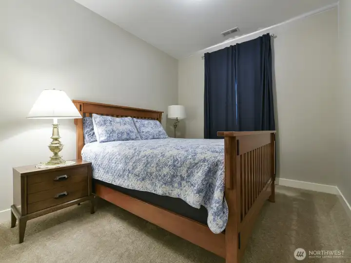 Second and third bedrooms are on the opposite side of the home and share their own bath with full tub and shower.