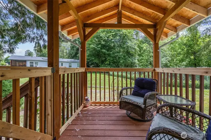The custom, covered front porch entry welcomes you home with charm. It’s perfect for morning coffee or evening relaxation. The craftsmanship adds instant curb appeal.