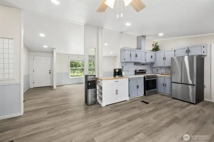 Remodeled kitchen designed with both function and style in mind. Fresh finishes and thoughtful updates make cooking a joy. New Samsung appliances elevate the kitchen’s performance. These sleek, modern appliances are built for efficiency and reliability. Best of all, they stay with the home.