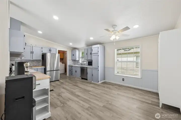 Bright dining space filled with natural light. It’s the perfect spot for meals, work, or conversation. The openness enhances the home’s welcoming feel.