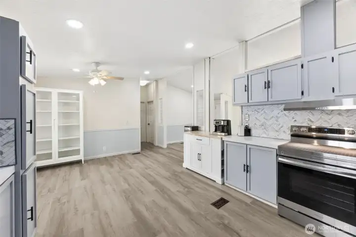 Premium waterproof LVP flooring runs throughout the entire home. Durable, stylish, and easy to maintain, it’s ideal for busy living. The cohesive look ties every room together beautifully.