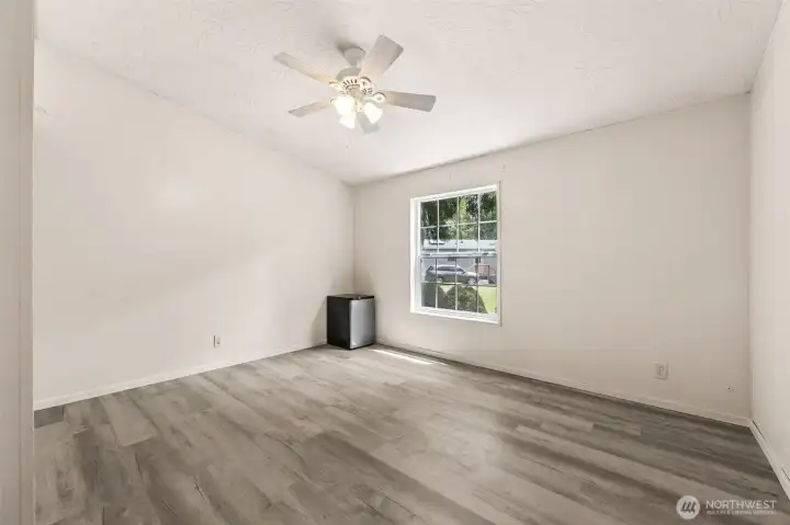 Bedroom #3.  Newer Energy-efficient, vinyl windows throughout the home help maintain comfortable temperatures year-round. They reduce noise and improve insulation. A smart upgrade that boosts efficiency and comfort.