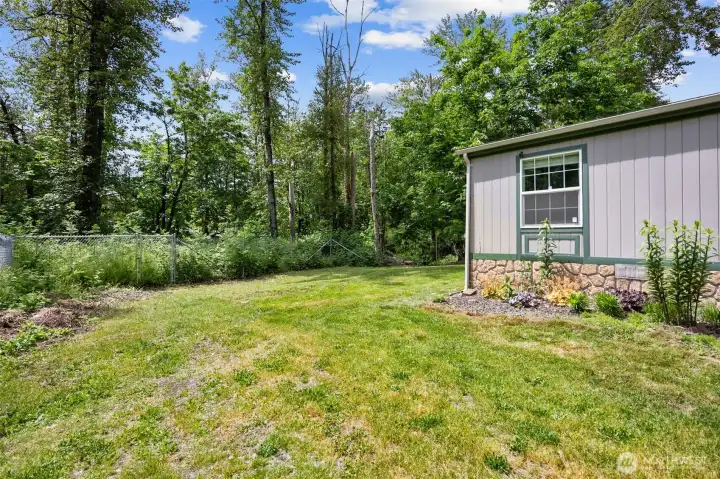 Expansive lot offering one of the largest yard spaces in the community. There’s room to garden, play, or simply enjoy the outdoors. The added privacy makes it feel like your own retreat.