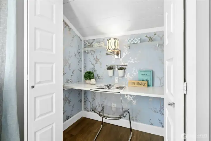 This clever closet is now a study space; closet space still retained to the right (unseen)