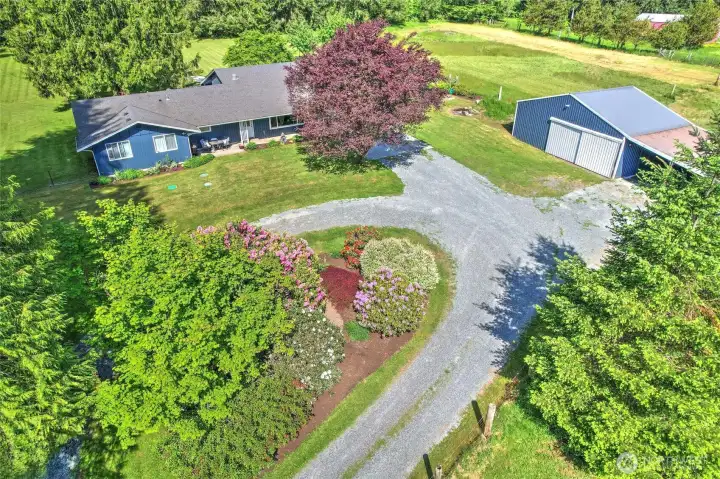 With 4 bedrooms — including two oversized primary suites — plus two bonus rooms and 3 full bathrooms, there’s space for everyone.