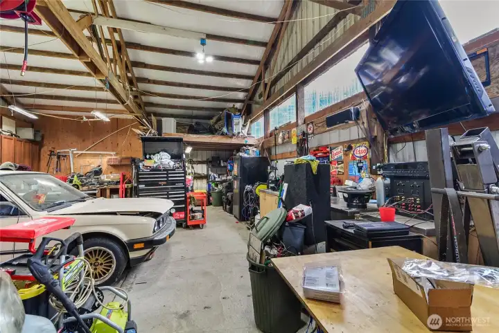 Shop interior — enormous workspace for cars, tools, and projects