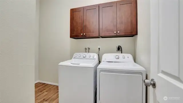 Large utility room with storage & appliances stay!
