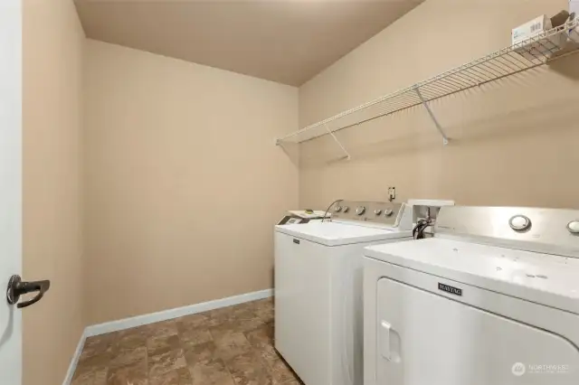 laundry room conveniently located with upstairs bedrooms