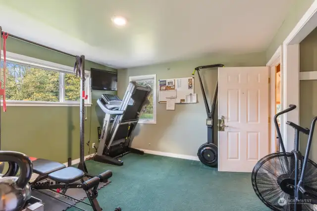 Downstairs bedroom, currently used as an exercise room.