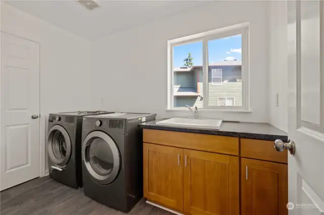 Utility Room; New SS Washer & Dryer stays with buyer!