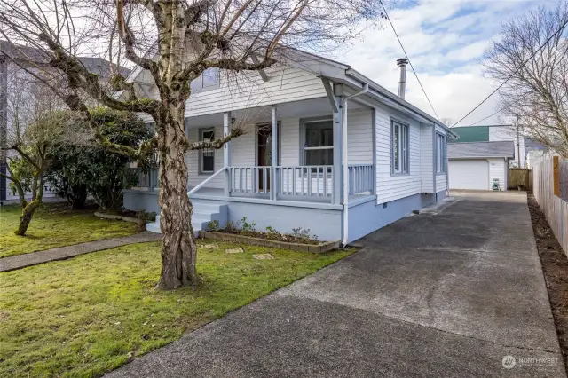 Long driveway leads to the detached 2-car garage