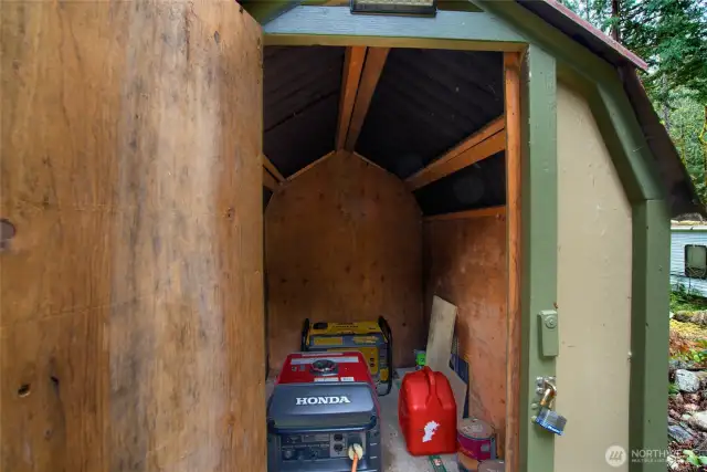 Inside view of generator shed. Yellow generator conveys, red does not.