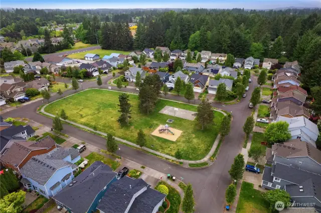 Community park, playground, and sports court.
