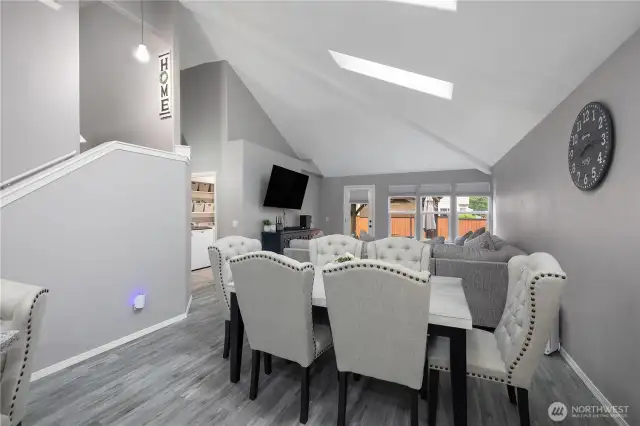 Dining area from kitchen thru to LR or Great Room. new floors, lighting, paint, trim...