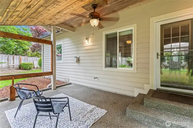 The covered patio just off of the great room provides an ideal space to connect your gas barbecue, host gatherings, and enjoy a pleasant summer evening.