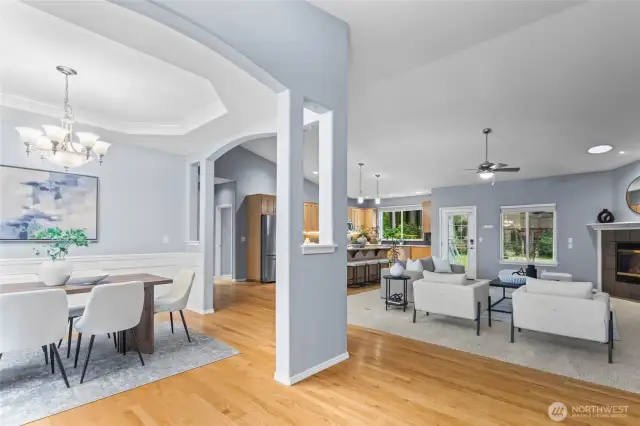 Upon entering, the open-concept floor plan warmly welcomes guests enjoy your new home. The hardwood floors are in excellent shape, and the carpets have been recently cleaned. A vaulted ceilings, arched doorways, and architectural details enhance the updated features throughout.