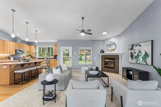 With ample space to accommodate all your entertainment and needs, the great room's open-concept design ensures a more comfortable setting for gatherings. Note the circular skylight above the gas fireplace that brings in added sunlight into this space.
