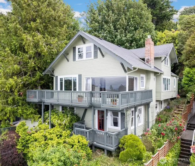 Nestled behind Beach Drive, this Craftsman home boasts Sound and Mountain views.  This is just a stone's throw from beach access!