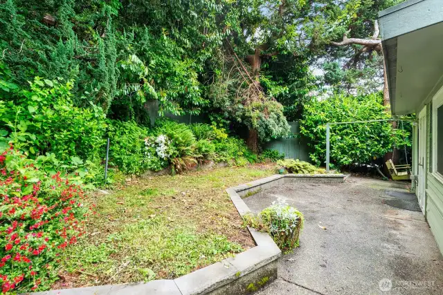 Garden space and patio behind.