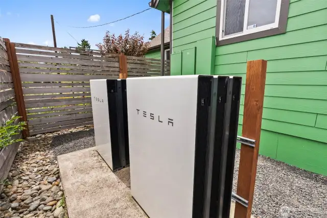 6 Tesla Powerwalls - Battery Storage - works like a generator.