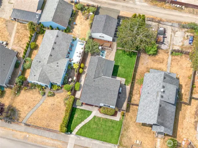 This home sits back from the sidewalk to enhance privacy and allows plenty of space for playing, gardening or enjoying the neighborhood views.